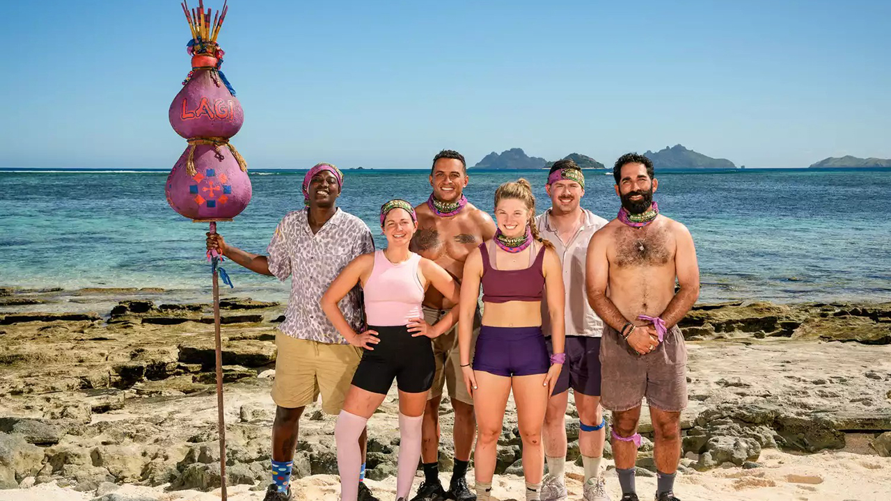 The Lagi tribe from Survivor 48 posing on the beach.